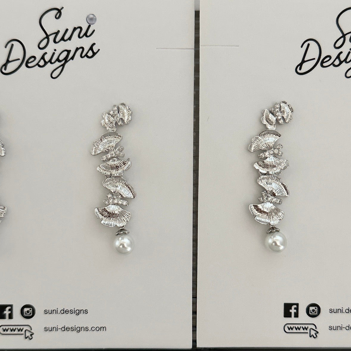 E18 Radiant Butterfly Pearl Earrings