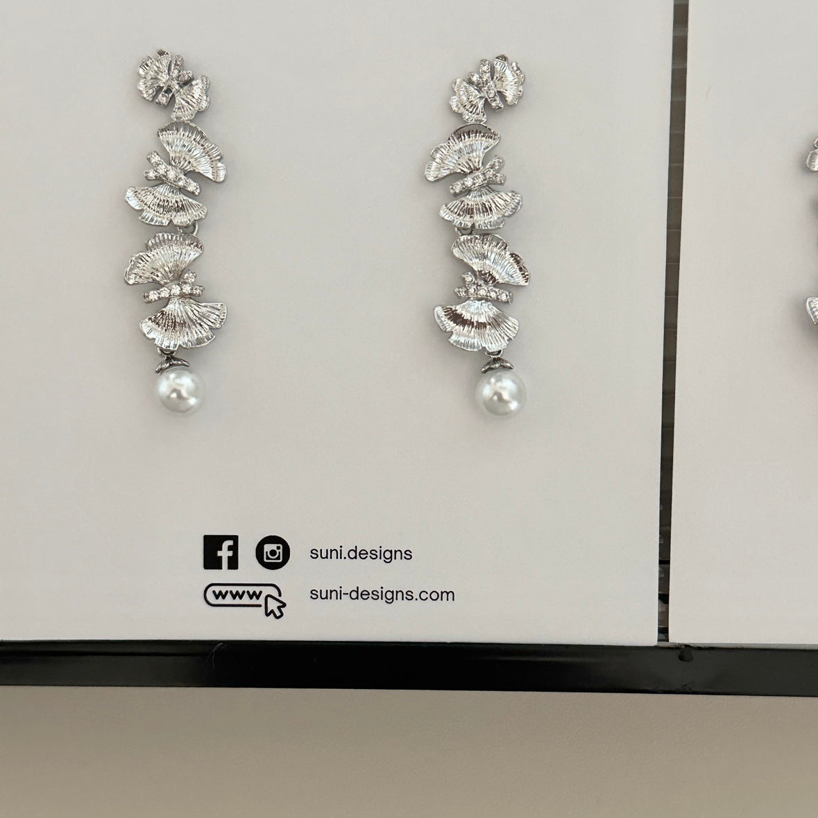 E18 Radiant Butterfly Pearl Earrings