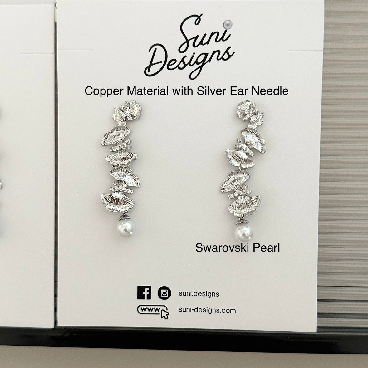 E18 Radiant Butterfly Pearl Earrings