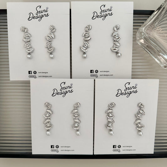 E18 Radiant Butterfly Pearl Earrings